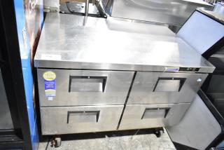 Everest Commercial 4 Drawer Cooler, stainless steel, 115 volts, 1 phase, warranty sticker, on wheels, good condition.