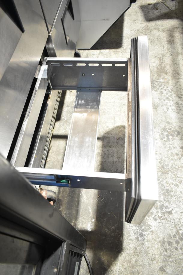 Everest Commercial 4 Drawer Cooler, stainless steel, 115 volts, 1 phase, shown with open drawer, gently used condition.