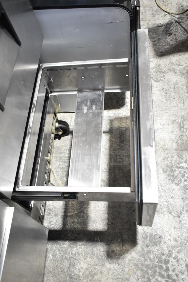 Everest Commercial 4 Drawer Cooler, 115 Volts, 1 Phase. Open stainless steel drawer, showcasing interior. Good condition.