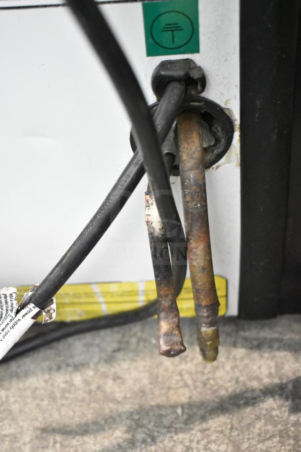 Torrey TEC130L-UL Deli Display Case wiring and connections, 127V, 1 Phase, visible grounding label, signs of wear.