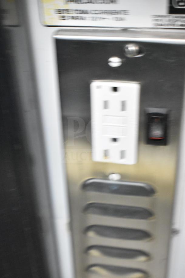 Torrey TEC130L-UL commercial deli display case, 127 volts, 1 phase. Features stainless steel details and label; control panel visible.