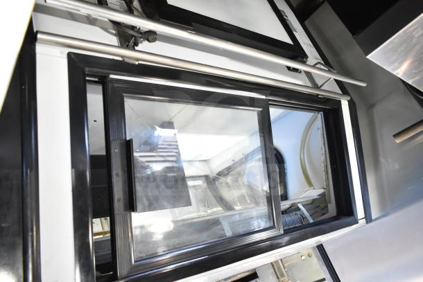 Torrey TEC130L-UL commercial deli display case, floor style, 127 volts, 1 phase, features glass door and stainless steel finish.