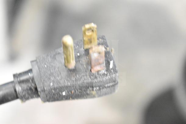 Close-up of a power plug for a True T-35 Commercial 2 Door Reach In Cooler, indicating 115 Volts, 1 Phase connection.