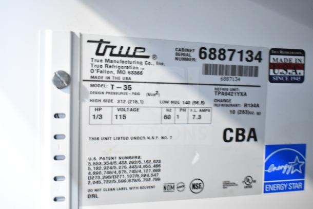 True T-35 Commercial Cooler label showing model, 115V, 1 phase, 1/3 HP, serial number 6887134, made in USA.