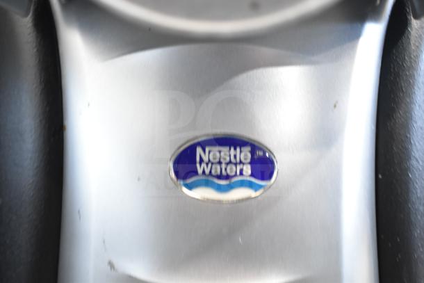 SOBP210ESNS countertop water dispenser base with Nestle Waters logo, 115 volts, 1 phase, model in good condition.