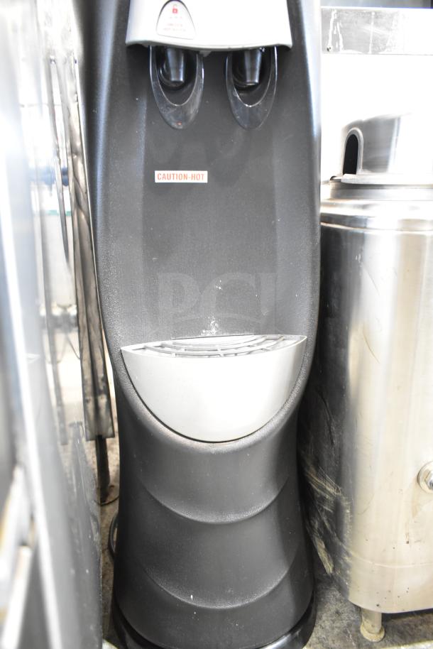 SOBP210ESNS countertop water dispenser base, black, 115 volts, 1 phase, with "Caution: Hot" label visible.