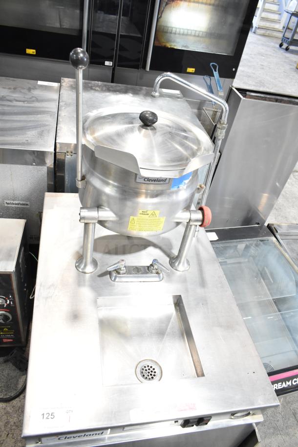 Cleveland 24EMK624 electric tilting 6-gallon steam kettle with generator base, 208V 3-phase, stainless steel, good condition.
