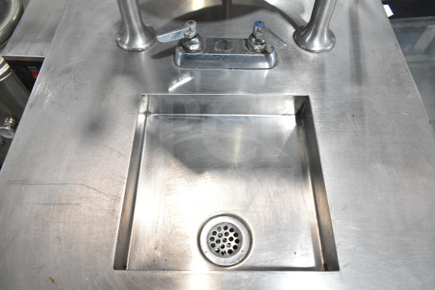 Cleveland 24EMK624 electric tilting kettle, stainless steel, dual faucets, modular generator base shown.