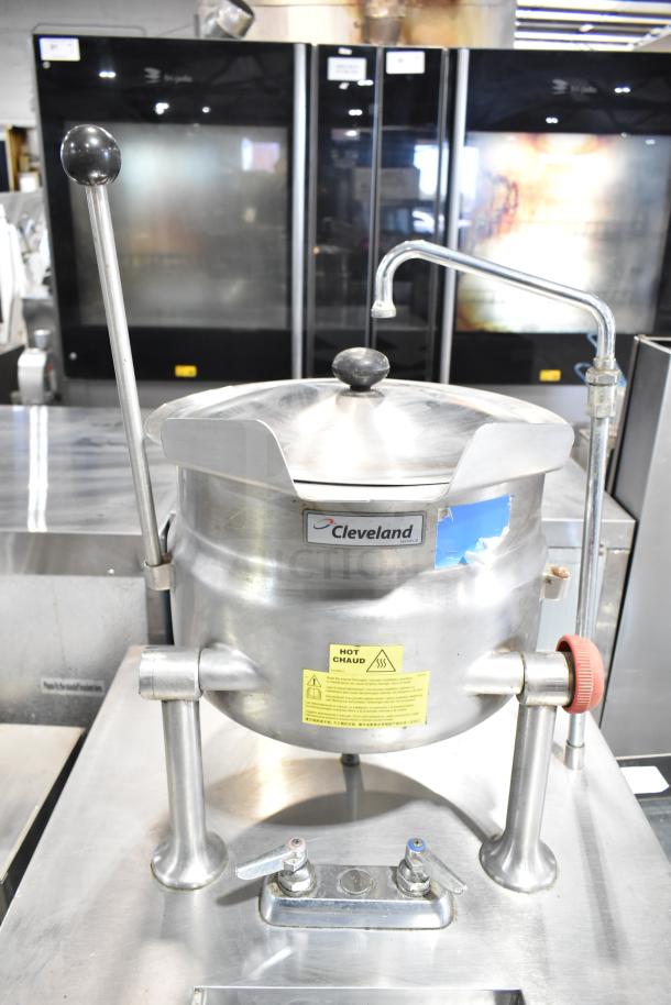 Cleveland 24EMK624 electric tilting kettle, 6-gallon capacity, steam jacketed, with attached modular generator base. Model 24EMK624.