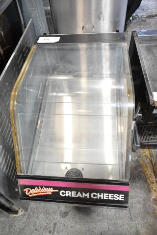 Structural Concepts DD17R Refrigerated Dual Service Merchandiser, 120V, 1 Phase. Glass panels, branded "Delicious Cream Cheese."