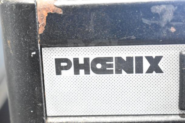 Unic Phoenix commercial espresso machine, single group, steam wand, 115V, 1 phase, shows wear and rust on the surface.