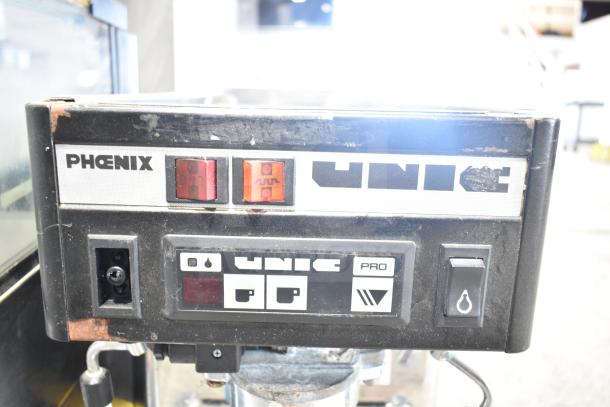 Unic Phoenix commercial single group espresso machine with steam wand, showing control panel. Model: Phoenix, 115 Volts, 1 Phase.