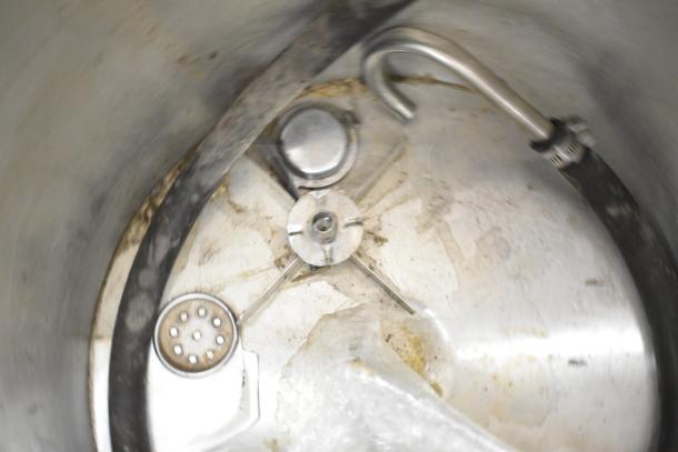 Oscar Fisher stainless steel tank, used condition, includes piping and valve components, minor wear visible inside.