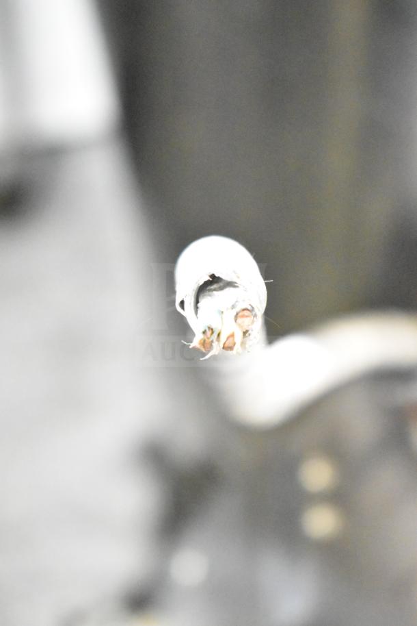 Cecilware Commercial Countertop Hot Tea Urn with frayed electrical wiring, indicating need for repair or replacement.