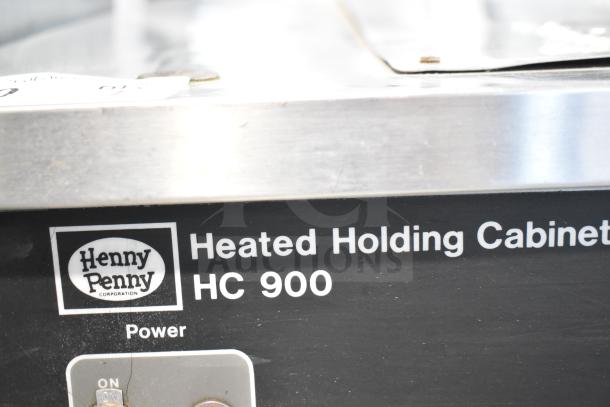 Henny Penny HC900 Heated Holding Cabinet, commercial casters, 115V, 1 Phase, brand label visible, power indicator.
