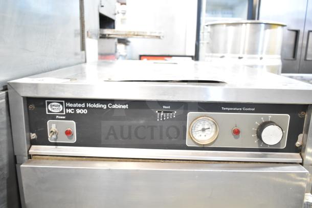 Henny Penny HC900 Heated Holding Cabinet, 115V, 1 Phase, commercial casters, temperature control, visible control panel.