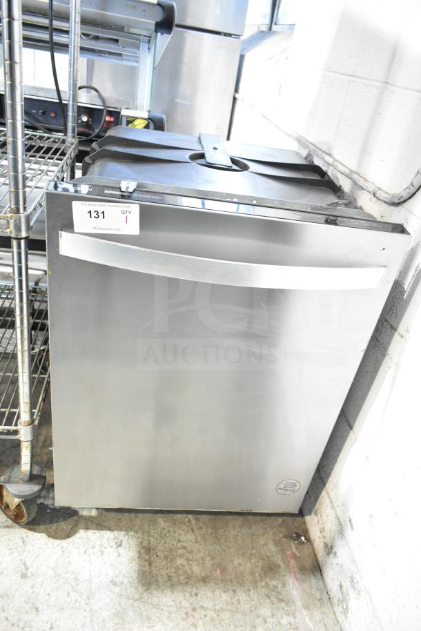 Whirlpool WDT30HAMZ0 undercounter dishwasher, stainless steel, 115 volts, 1 phase, auction tag visible.