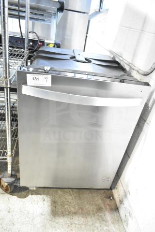 Whirlpool WDT30HAMZ0 undercounter dishwasher, stainless steel, 115 volts, 1 phase, auction tag visible.