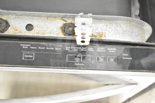 Whirlpool WDT30HAMZ0 undercounter dishwasher control panel, features cycle and option buttons. Visible wear on metal frame.
