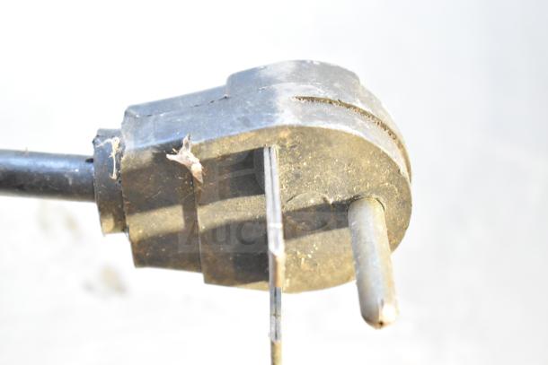 Holman 214HX Conveyor Oven plug, 208V, 1 Phase, showing signs of wear, suitable for commercial use.