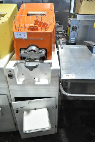 Juice Tree 106 Commercial Citrus Juicer, floor style, 115 volts, 1 phase, orange casing, visible wear, auction tag 139.