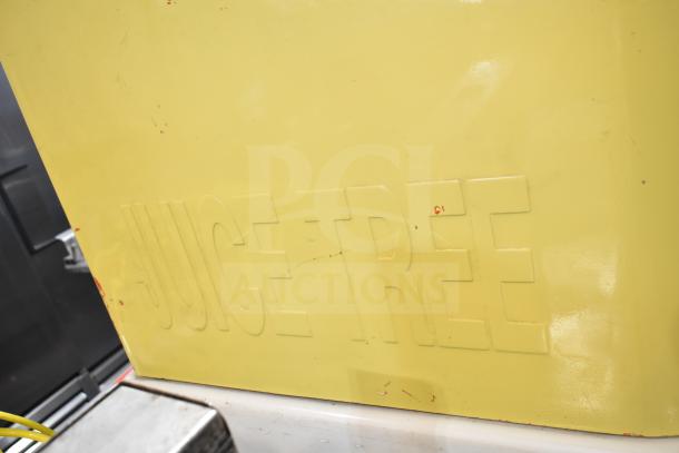 Juice Tree 105 commercial citrus juicer, yellow exterior with embossed brand name, floor style model, 115 volts, 1 phase.