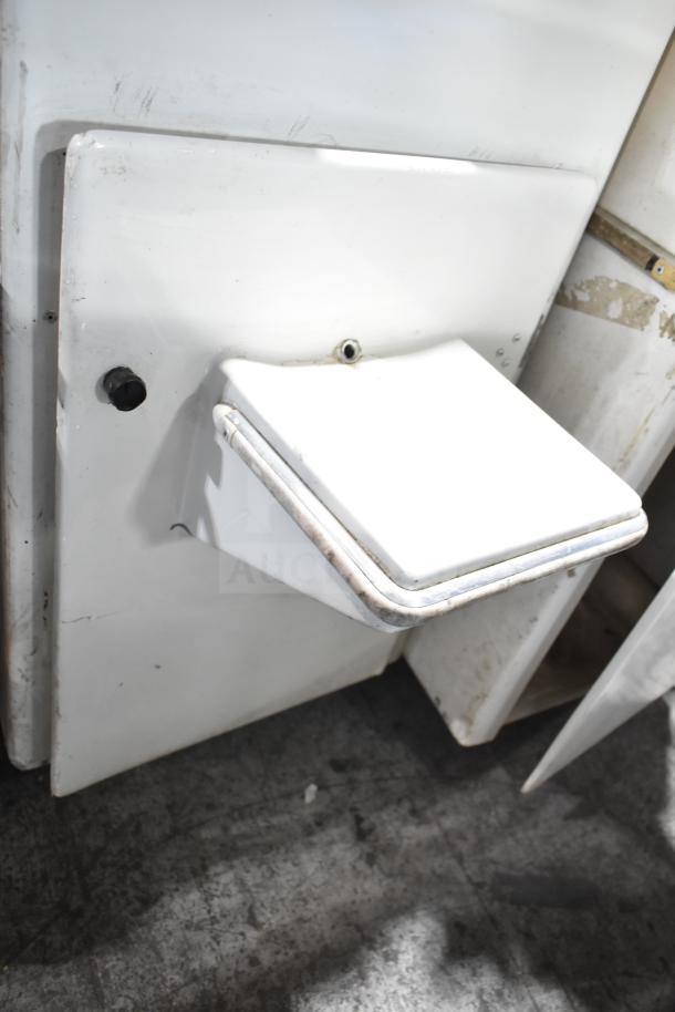 Juice Tree 105 Commercial Citrus Juicer, white, floor style, 115V, 1 phase, visible wear, sturdy construction.