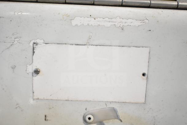 Juice Tree 105 Commercial Citrus Juicer, floor style, 115 volts, 1 phase. Visible surface wear and empty label slot.