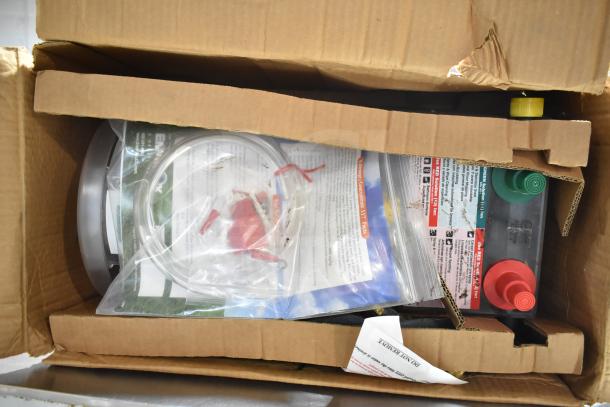 Blend Buddy Wall Mounting Dispensing System in original box. Includes hoses, fittings, and manuals. Unused condition.