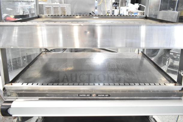 Hatco GRSDS-36D heated merchandising display. Stainless steel, dual shelves, caution hot labels. 120V, 1 phase. Used condition.