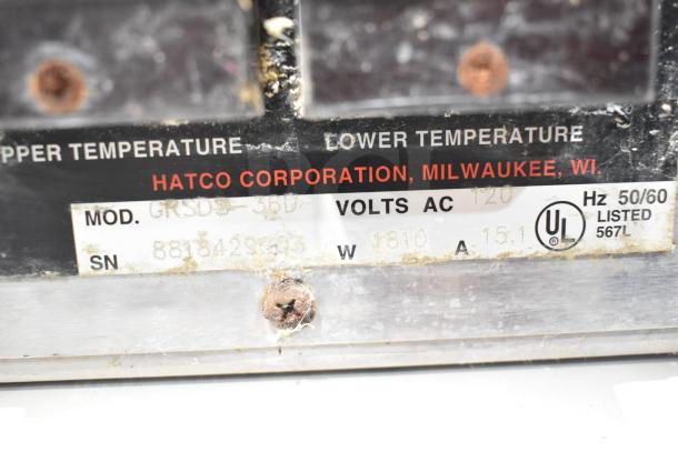 Hatco GRSDS-36D heated display label, shows model, voltage 120V, and UL listing. Visible wear and rust on screws.