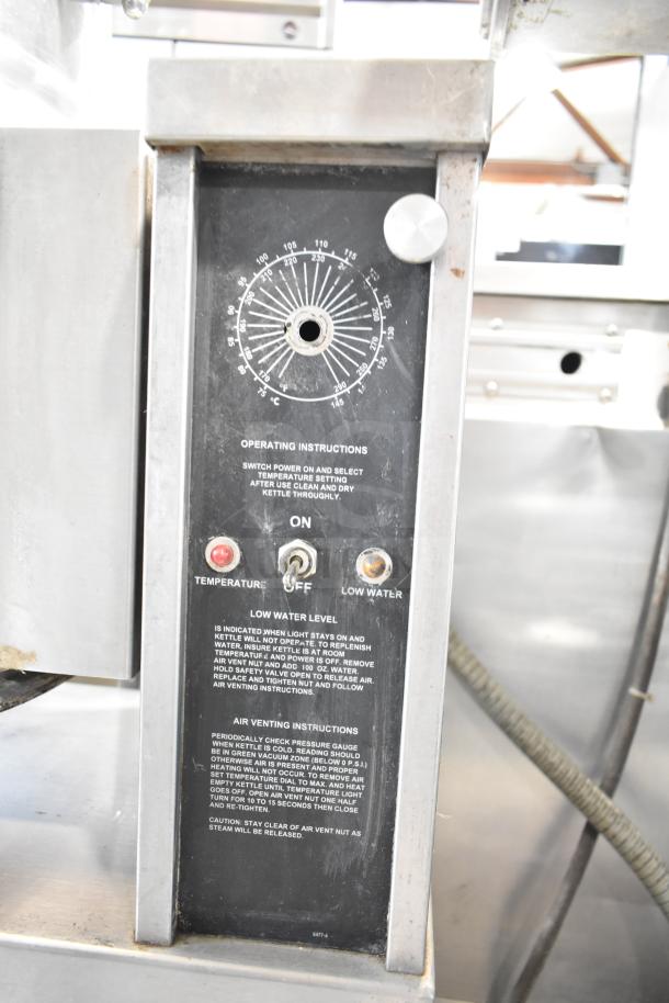 Crown Steam EC-10TW tilting kettle control panel, showcasing temperature dial, indicator lights, and operating instructions.