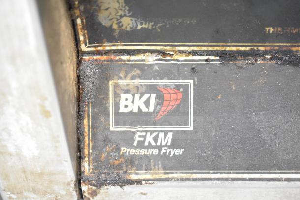 BKI FKM-F Commercial Electric Pressure Fryer on casters, visible wear, 208/230V, 3 Phase, branding label shown.