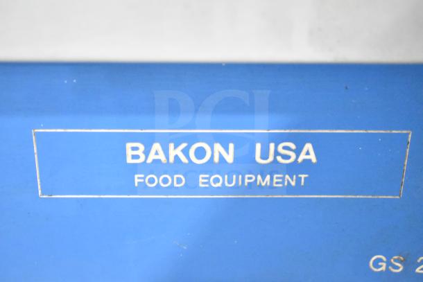 Bakon GS 250 Commercial Unit on casters, 110V, 1 Phase. Visible label: "Bakon USA Food Equipment." Blue exterior.