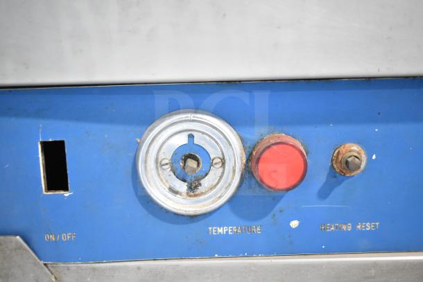 Bakon GS 250 commercial unit control panel, featuring temperature dial, red reset button, on/off slot; visible wear.