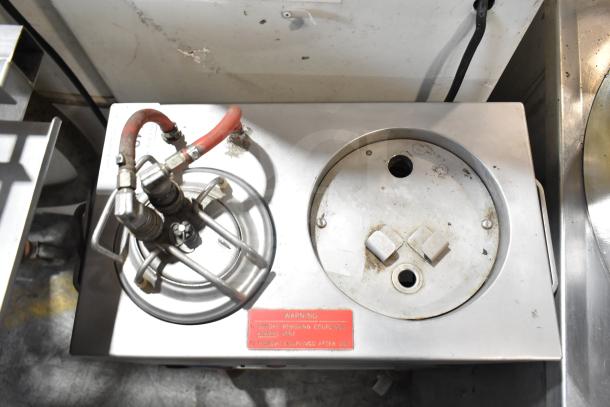 Bakon GS 250 commercial unit on casters, 110V, 1 Phase. Features hoses, vent, and user instructions. Shows signs of use.