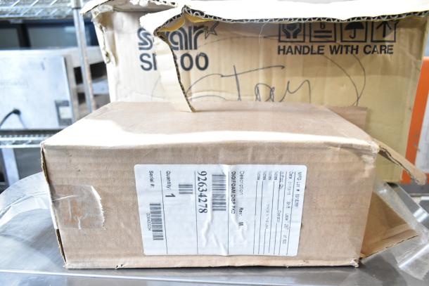 Belshaw TG50 soap dispenser and Star SP300 receipt printer in original packaging, labels showing model and serial numbers.