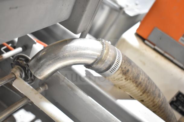 Belshaw TG50 Thermoglazing Station, commercial casters, 208V, 1 phase. Close-up of tubing and fittings in used condition.