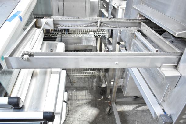 Belshaw TG50 Commercial Thermoglazing Station, floor style, on casters, 208V, 1 Phase, stainless steel, industrial setting.