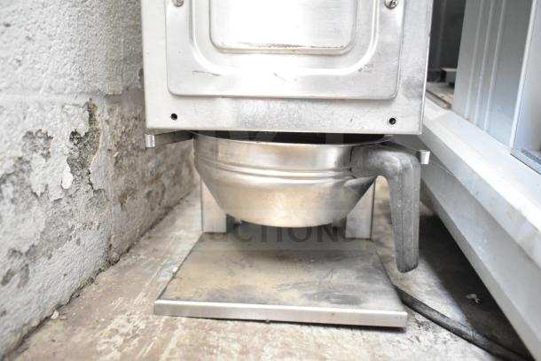 Bunn G9 Commercial Countertop Coffee Bean Grinder, stainless steel, visible wear, 120 Volts, 1 Phase, durable construction.