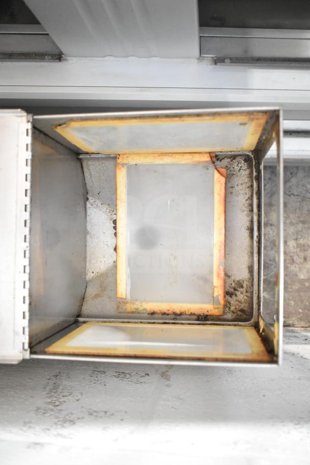 Bunn G9 commercial coffee grinder with open top, showing interior condition. Rust visible around edges. 120V, 1 Phase.