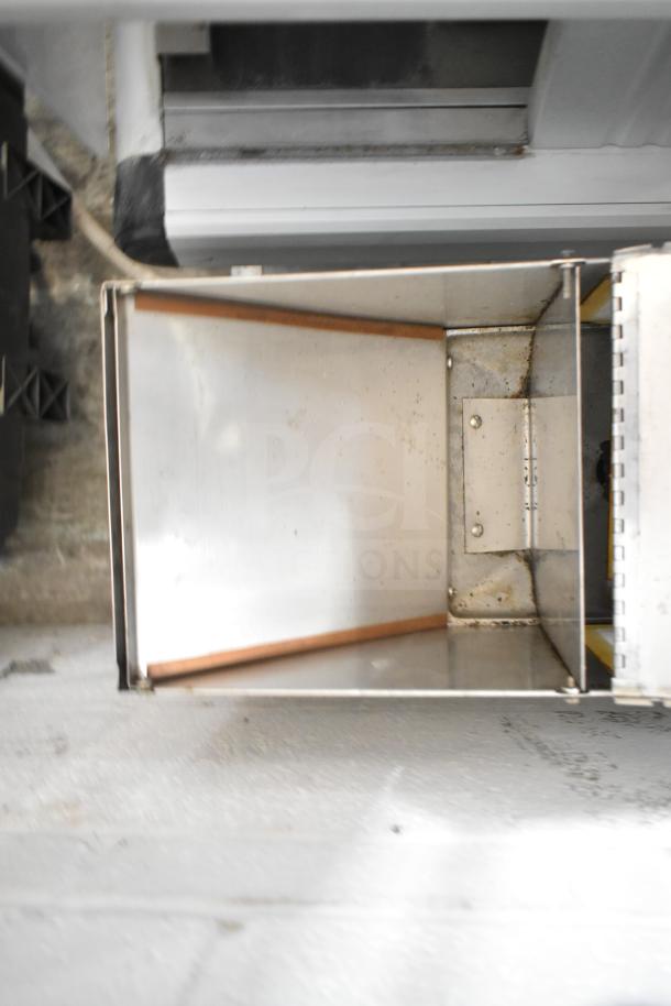 Bunn G9 commercial countertop coffee bean grinder interior. Appears used with visible signs of wear. Model G9, 120V, 1 phase.