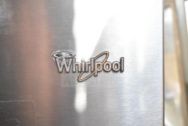 Whirlpool reach-in cooler, model WRT511SZDM00, stainless steel. Logo visible, runs on 115 volts, 1 phase.