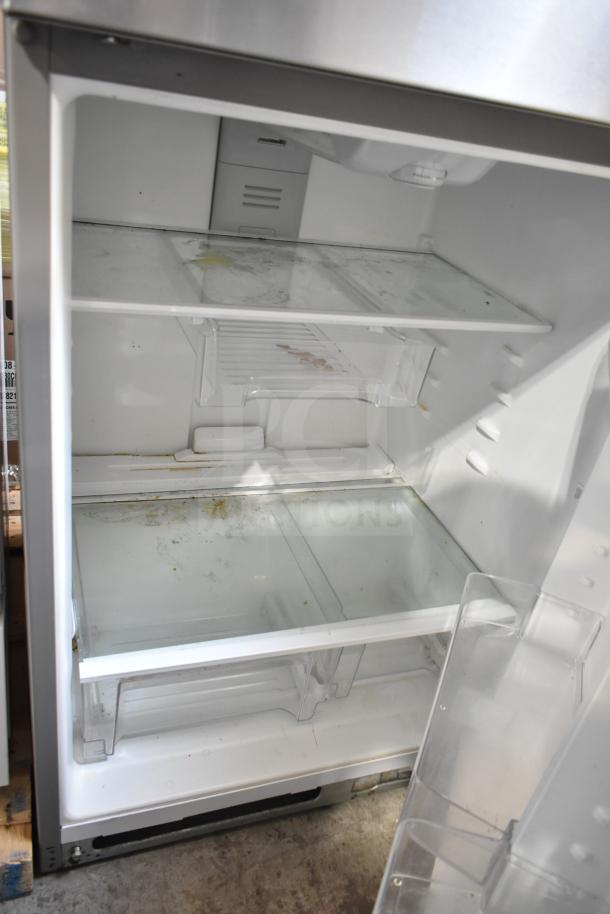 Whirlpool WRT511SZDM00 reach-in cooler with freezer, 115V, 1 phase. Shelves intact, needs cleaning. Good condition.