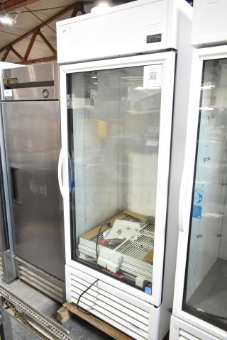 2025 True TSCI-600R-G-PH cooler, single door, 115V, 1 phase, glass front, empty interior, commercial use, excellent condition.