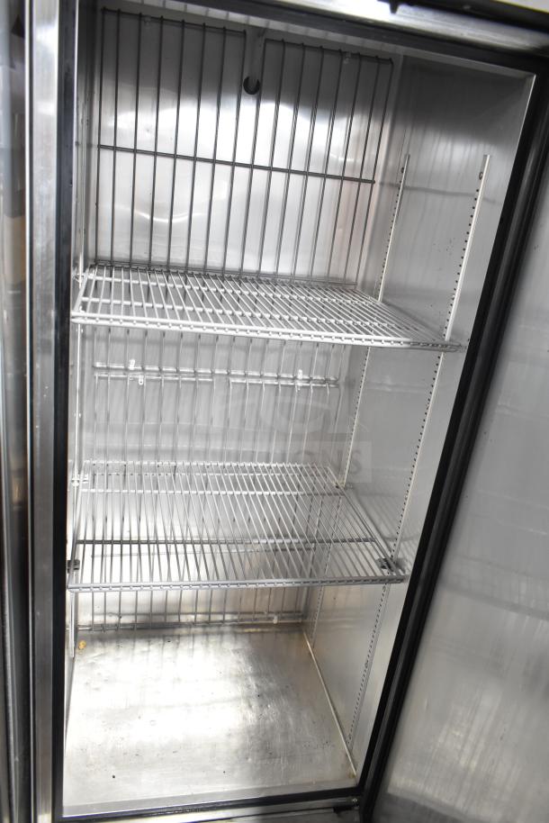 2016 True T-19F commercial reach-in freezer, single door, 115 volts, 1 phase, stainless steel, three wire shelves, good condition.