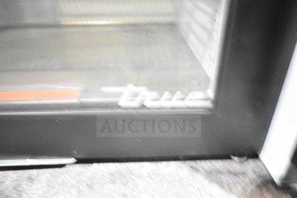 True GDM-05-HC mini cooler merchandiser, single door, visible logo, black frame, commercial use, 115 volts, 1 phase.