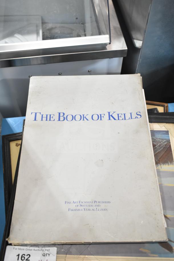 6 various items including "The Book of Kells" facsimile by Faksimile-Verlag Luzern, framed pictures, all in used condition.