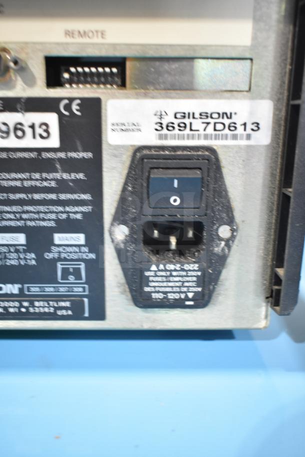 Gilson HPLC System with UV/Vis Detector, showing rear power switch and serial number 369L7D613.