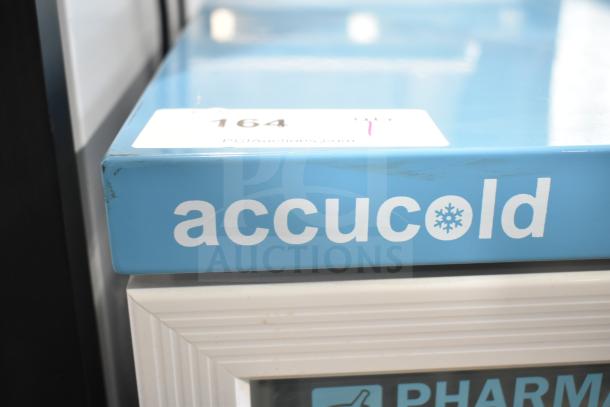 Accucold ARG6PV Mini Cooler Merchandiser, blue, 110 volts, 1 phase, visible small scuffs, ideal for pharmacy use.